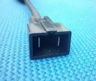 Adaptador para cargar las baterías de patinete