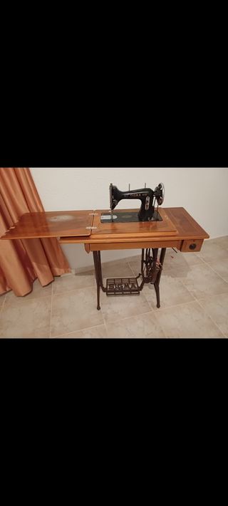Maquina de coser Singer