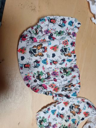 Babero  y cubre pañal frida