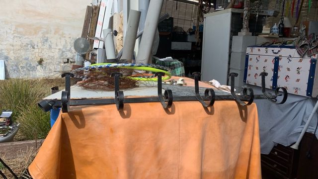 Appendino in ferro battuto