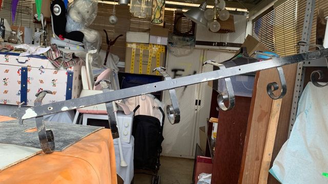 Appendino in ferro battuto