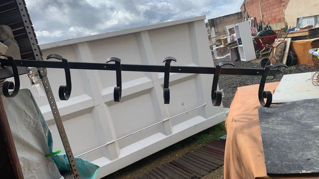 Appendino in ferro battuto