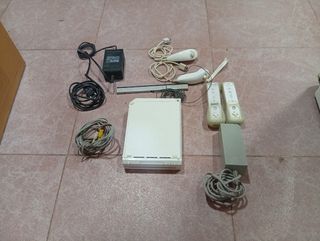 Nintendo Wii + 2 mandos 
Completa urgencia