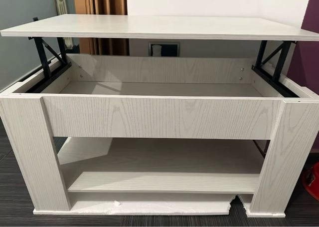 Tavolo centrale sollevabile. Nuovo.