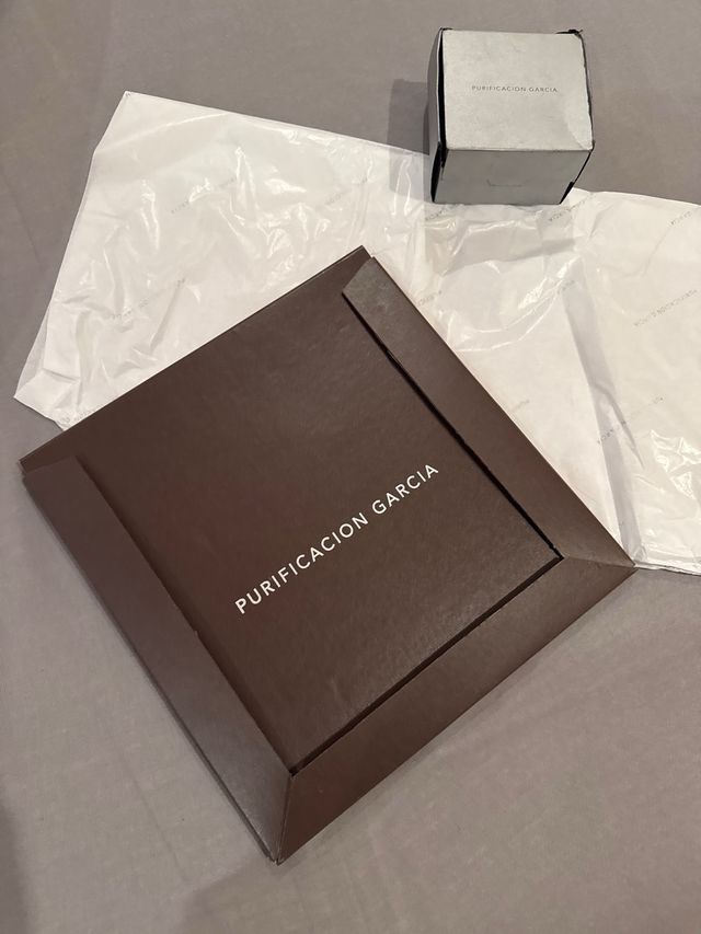 Caja sobre y papel de purificacion garcia