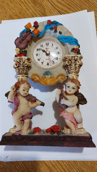 Orologio soprammobile con putti