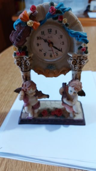 Orologio soprammobile con putti