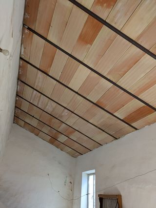 Casa antigua adosada