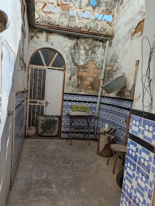 Casa antigua adosada