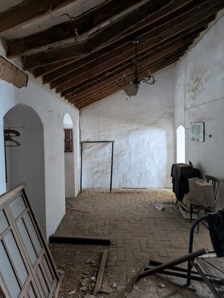 Casa antigua adosada