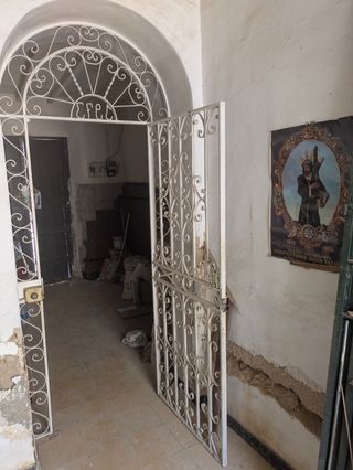 Casa antigua adosada