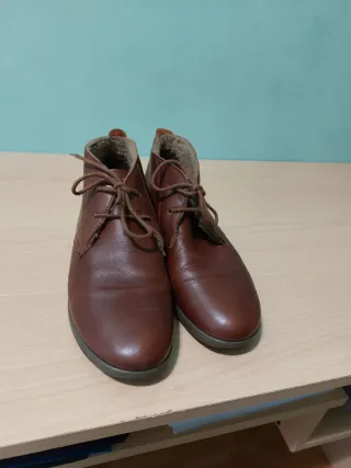 Botín de piel con cordones