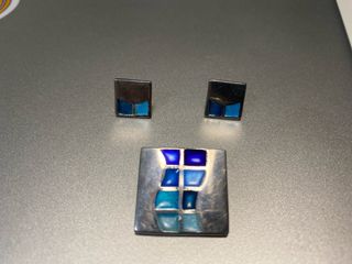 Conjunto de colgante y pendientes