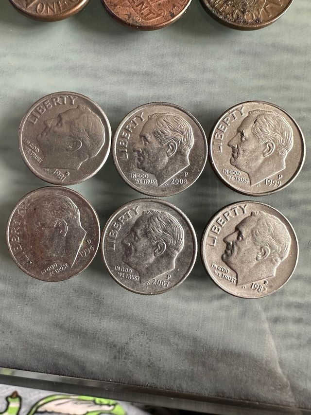 Lote 16 monedas de 1 y 10 centavos dolar americano
