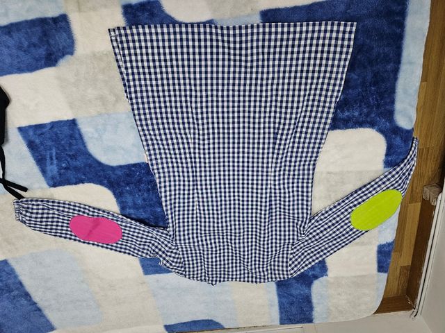 Bata profesora de cuadros y numeros