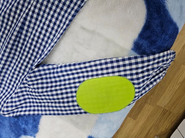 Bata profesora de cuadros y numeros