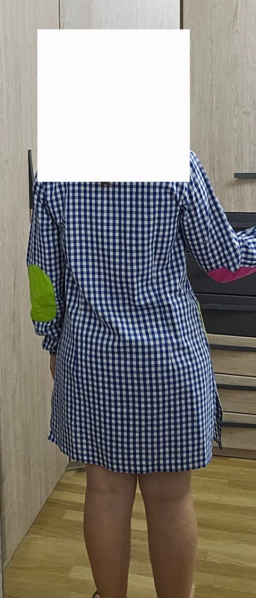 Bata profesora de cuadros y numeros