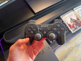 PS3 Slim 250 GB con mando y 3 juegos