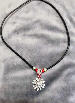 Colgante de eguzkilore con lauburu 