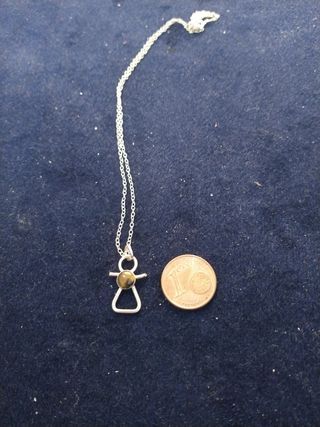 Colgante de Tanit,la diosa de Ibiza.Plata 1a ley.