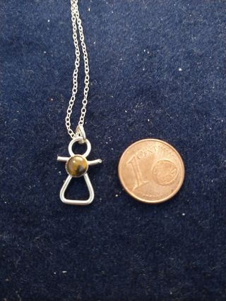 Colgante de Tanit,la diosa de Ibiza.Plata 1a ley.