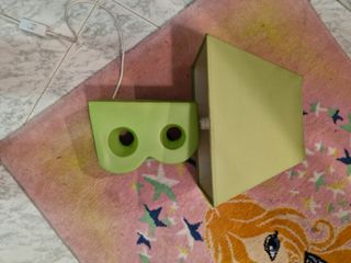 Cavalluccio e costruzioni in legno, tappeto....