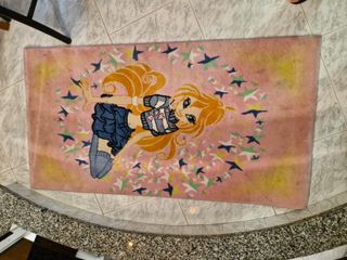 Cavalluccio e costruzioni in legno, tappeto....