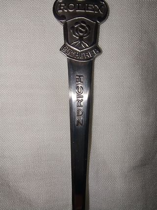 Cucharilla Rolex plateada