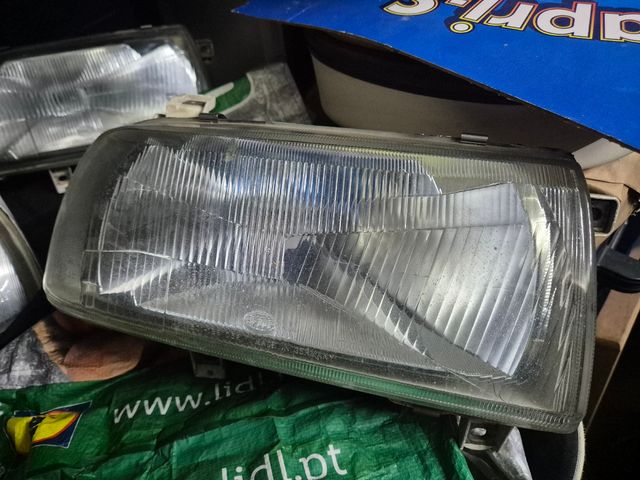 Faróis VW Vento Hella originais