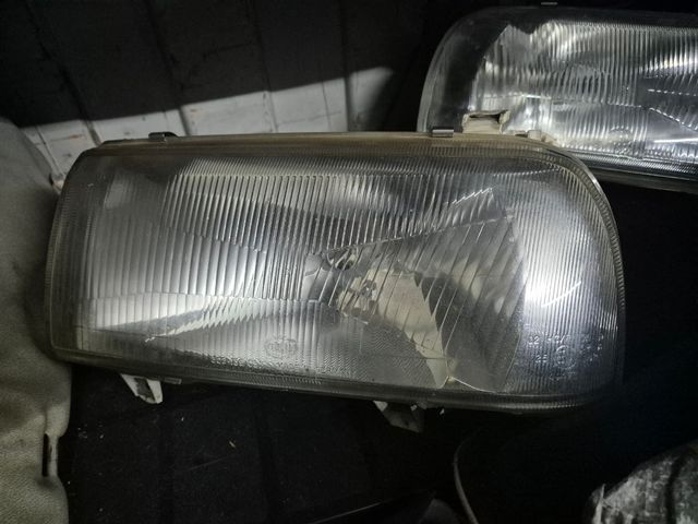 Faróis VW Vento Hella originais