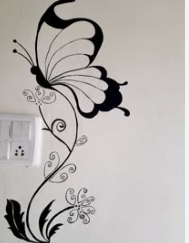 Dibujos pintados a mano en pared 