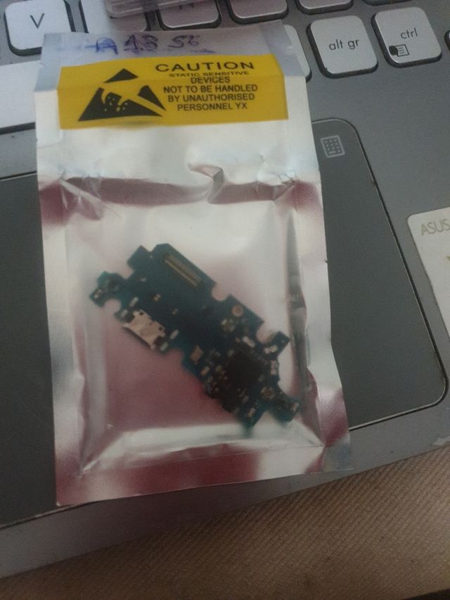 Flex de carga y  piezas sim y bateria samsung A21s