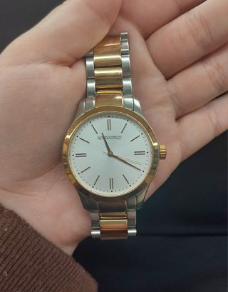 Reloj oro y plata