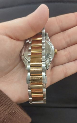 Reloj oro y plata