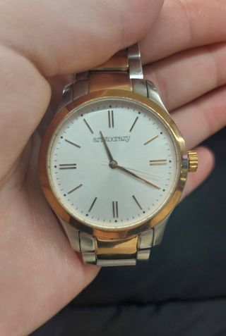 Reloj oro y plata