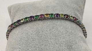 Pulsera riviere de 18 kt con gemas