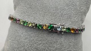 Pulsera riviere de 18 kt con gemas