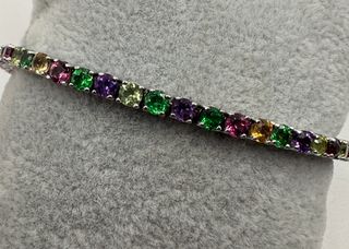 Pulsera riviere de 18 kt con gemas