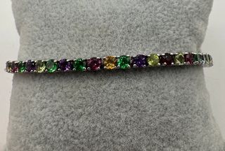 Pulsera riviere de 18 kt con gemas