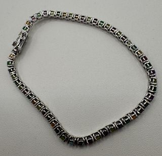 Pulsera riviere de 18 kt con gemas