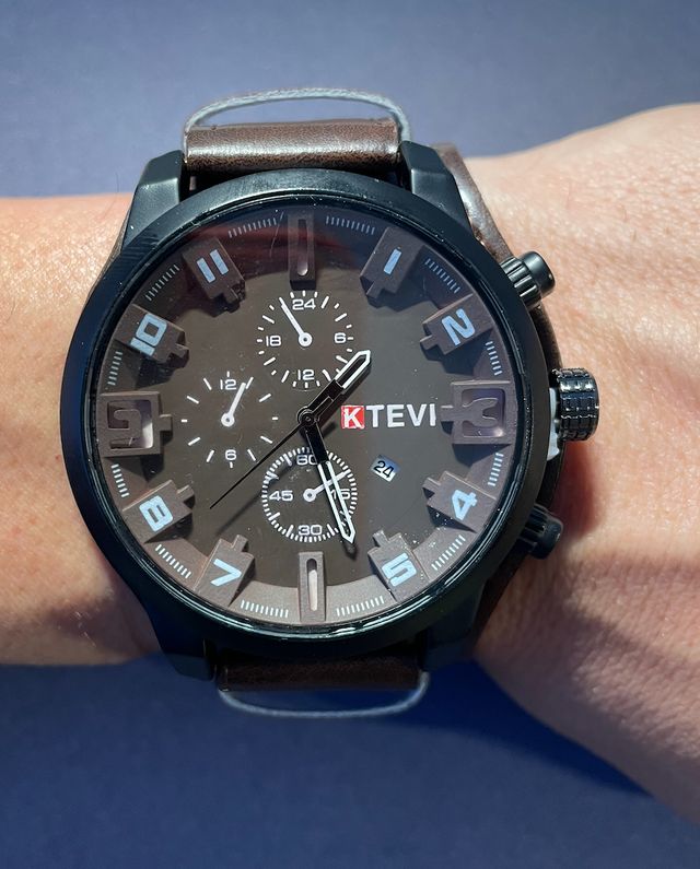 Reloj con pulsera de Cuero