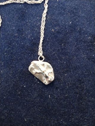 Colgante de lagarto ibicenco en plata pura.