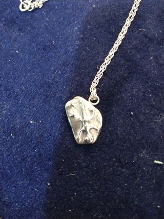 Colgante de lagarto ibicenco en plata pura.