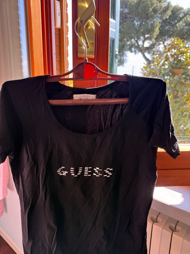 Maglia guess nera tg M con difetti