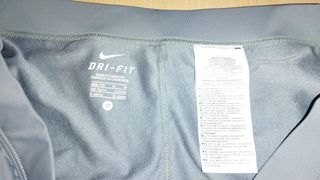 Falda pantalón Nike Dri Fit Gris con volante rosa