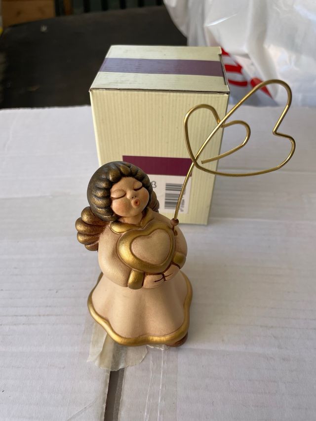 Angelo Thun con cuore portafoto