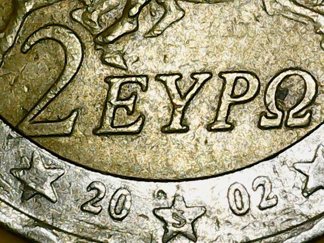 2 EUROS GRECIA 2002 CON EXCESO DE METAL Y " S "