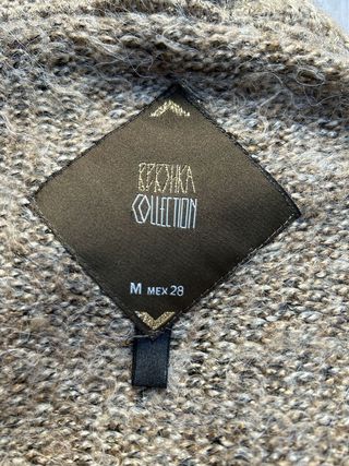 Jersey elegante estilo poncho