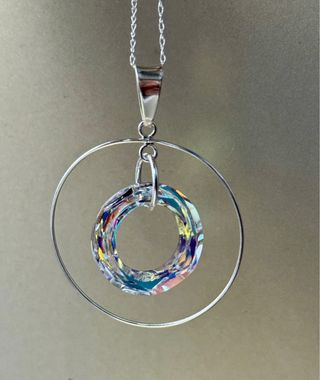 Colgante Swarovski Anillo cósmico en Plata de Ley