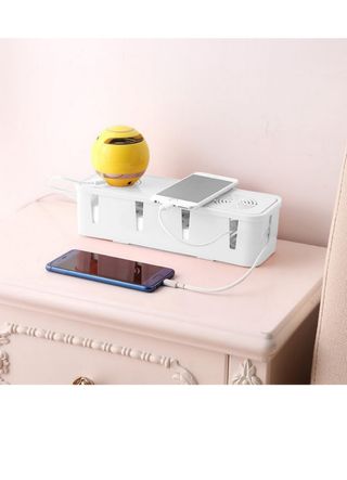 Caja de gestión y almacenamiento de cables